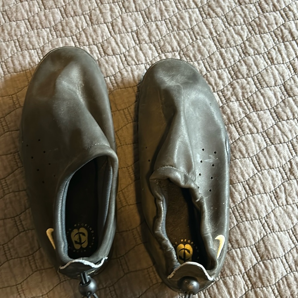 Nike ACG moccasin type shoe. With cinch tightening behind the ankle.